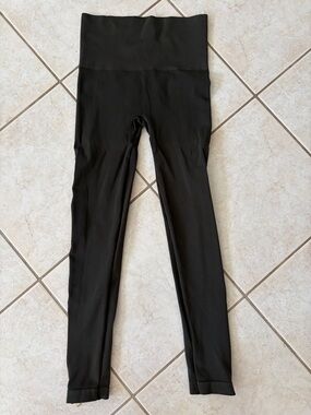 SPANX High-Waist olive green leggings with gold zippers at ankles